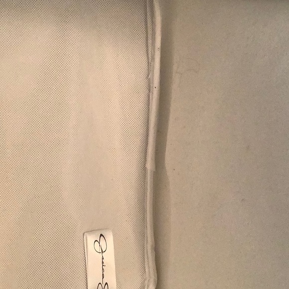 Jessica Simpson large tote. Has red spot on back and black spot on front. - Picture 3 of 4